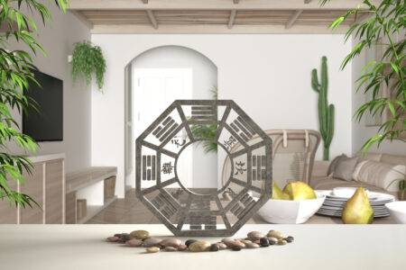 White,Table,Shelf,With,Pebble,Stone,And,Bamboo,Plants,,Minimalist